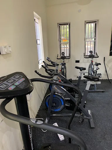 Cardio equipment room with exercise bikes and machines